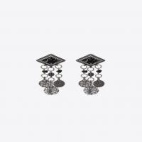 saint laurent marrakech diamond-shaped earrings in silver-toned tin with tassels