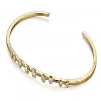 linear cuff bracelet in gold with diamonds