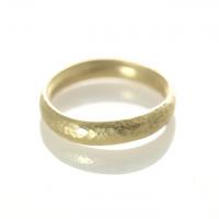 forged band in gold with hammered texture
