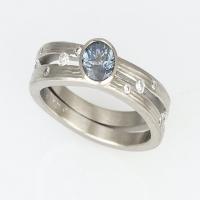 double wave band in white gold with center sapphire