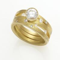triple wave band in gold with diamonds & center mounting
