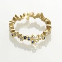 cascading stones ring in gold with sapphires & diamonds