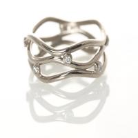 triple serpentine band in white gold with diamonds