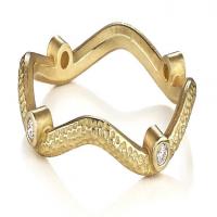 serpentine ring in gold with diamonds