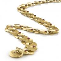swirl necklace in gold with rubies