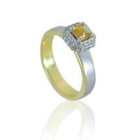 yellow diamond halo ring. palladium , 18ky gold, and a halo of white diamonds