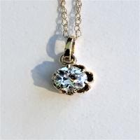 14kt y/g diamond solitaire pendant 0.50cts