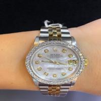 rolex datejust | two-tone | 31mm |custom diamond bezel and diamond dial | stainless steel and 18kt yellow gold