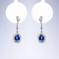 18k white gold oval blue sapphire in diamond halo hanging earrings