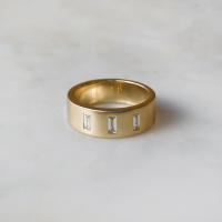 gold band with baguette diamonds