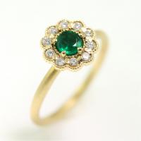 mosaic round ring in 18k yellow gold with .26ct emerald