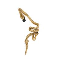 saint laurent le vian snake ear jewelry in gold metal with a black glass bead.
