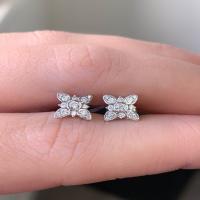 18kt white gold prong and bezel set round diamond earrings
