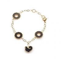 Chantecler Bracelet in yellow gold with four symbol in onyx and diamonds