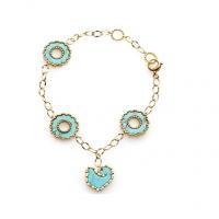 Chantecler Bracelet in yellow gold with four symbol in turquoise and diamonds