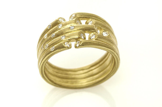 whisper ring in yellow gold with diamond sprinkle whisper ring in yellow gold with diamond sprinkle