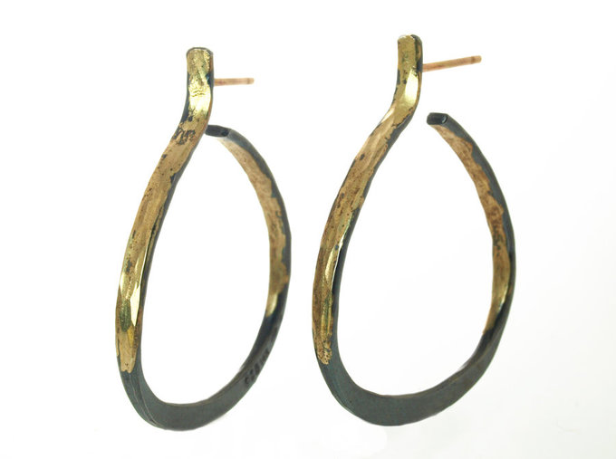 black forged hoops in gold and silver black forged hoops in gold and silver
