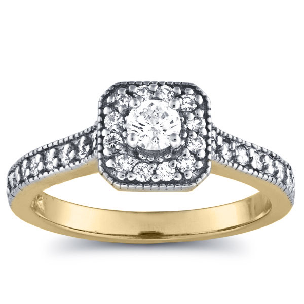 1/2 carat diamond halo ring in gold 1/2 carat diamond halo ring in gold