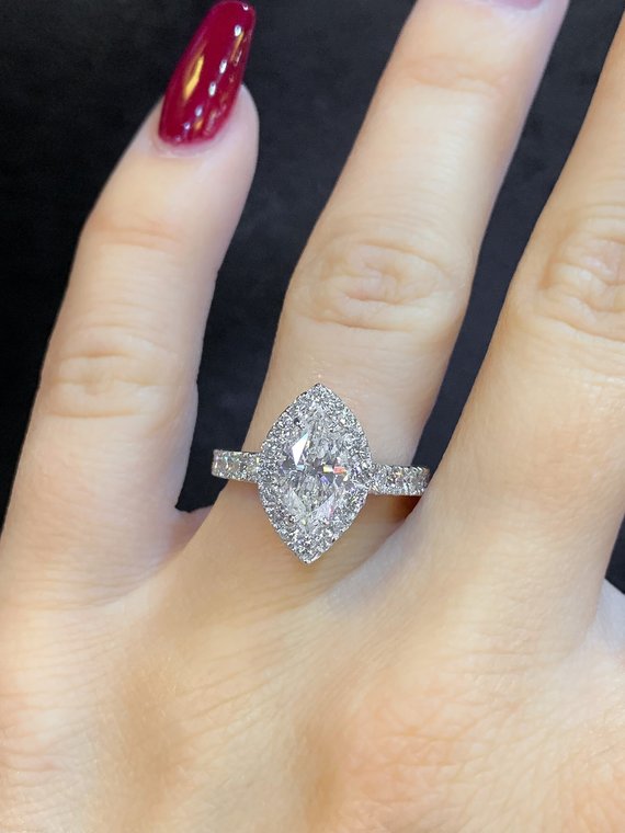 marquise diamond engagement ring | diamond halo | cathedral setting | 2.50 total diamond carat weight marquise diamond engagement ring | diamond halo | cathedral setting | 2.50 total diamond carat weight